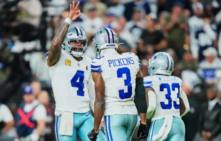 Dak Prescott #4 of the Dallas Cowboys celebrates after scoring a touchdown with teammate George Pickens #3 against the Las Vegas Raiders during an NFL football game at Allegiant Stadium on November 17, 2025 in Las Vegas, Nevada.