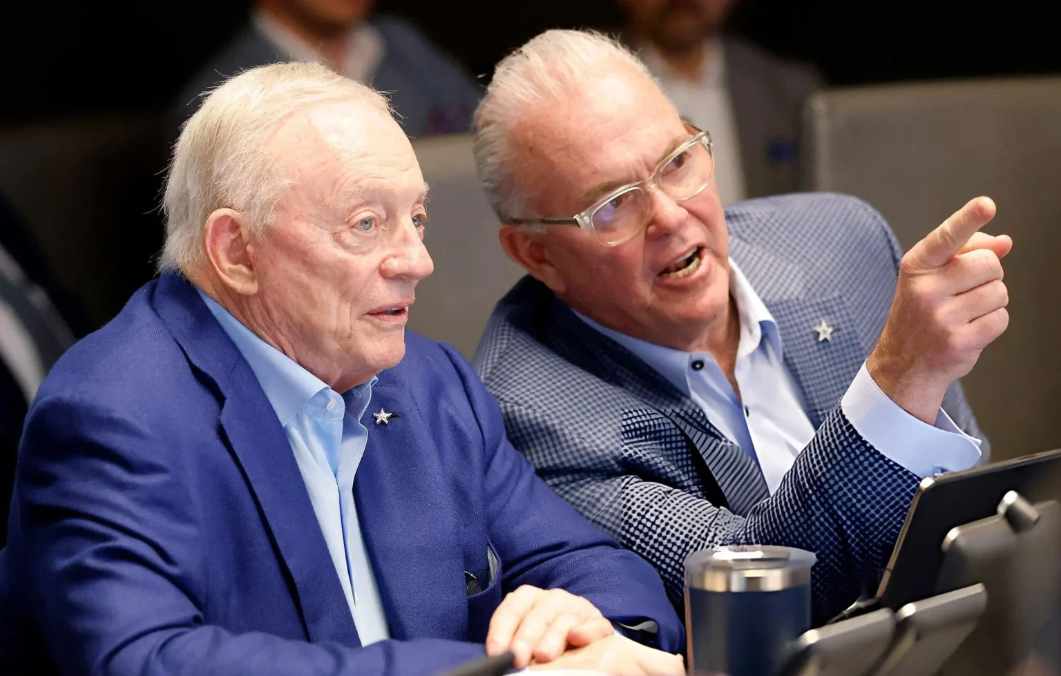 Dallas Cowboys owner Jerry Jones, COO Stephen Jones, Chief Brand Officer Charlotte Jones, Vice President of Player Personnel Will McClay, Vice President of Football Operations Todd Williams, head coach Brian Schottenheimer visit in the team's war room during the opening pick of the NFL Draft at The Star in Frisco, Texas