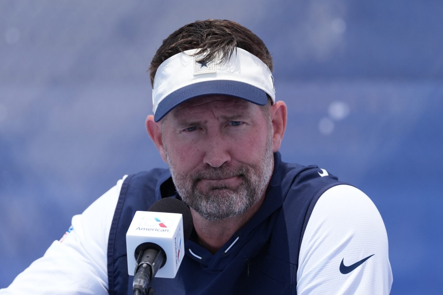Dallas Cowboys coach Brian Schottenheimer at training camp opening press conference at River Ridge Playing Fields.