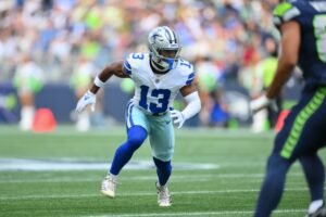 Aug 15, 2026; Seattle, Washington, USA; Dallas Cowboys safety Caleb Downs (13) during the first half against the Seattle Seahawks at Lumen Field